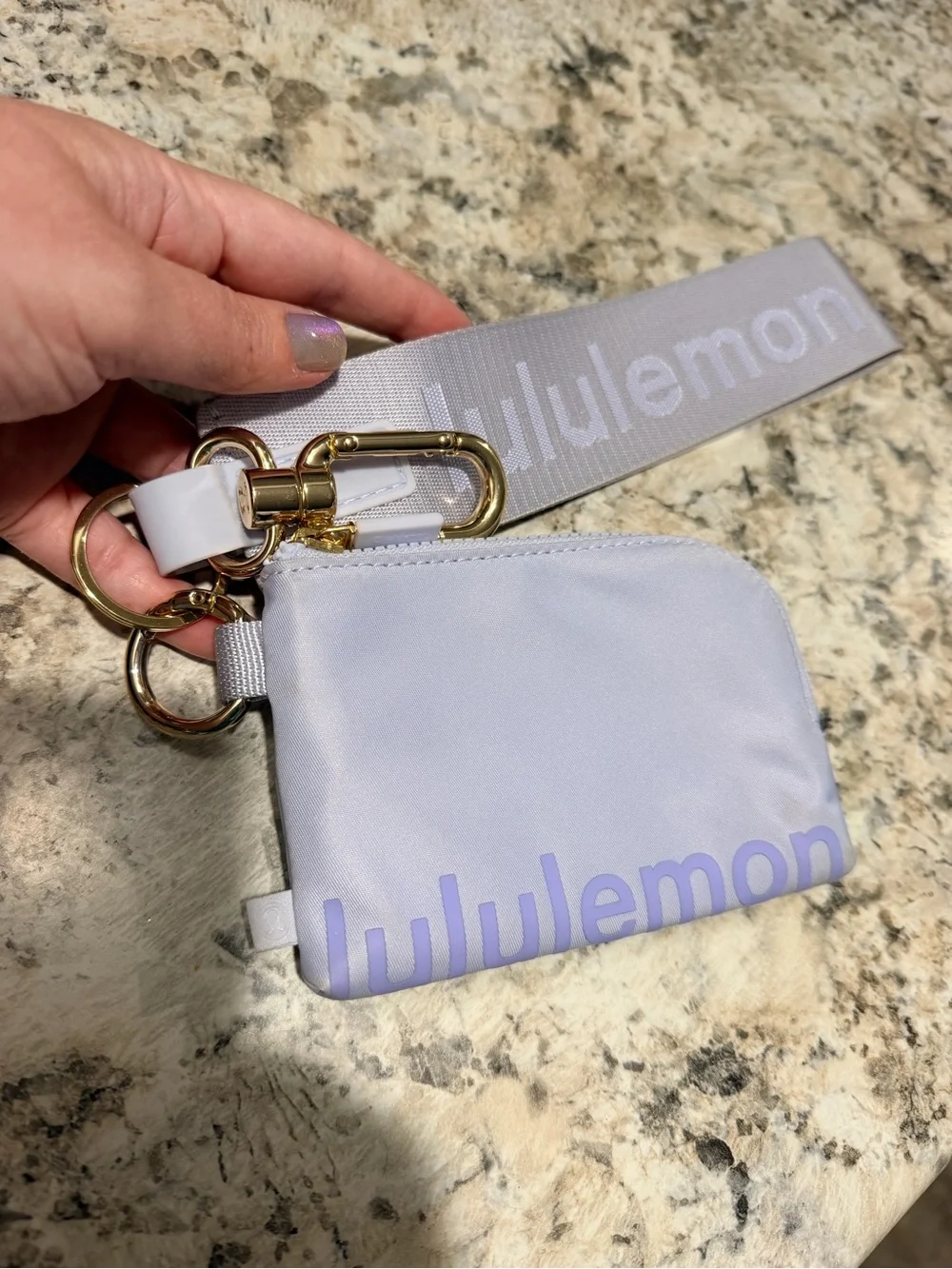 lululemon light lavender zip pouch with gold hardware